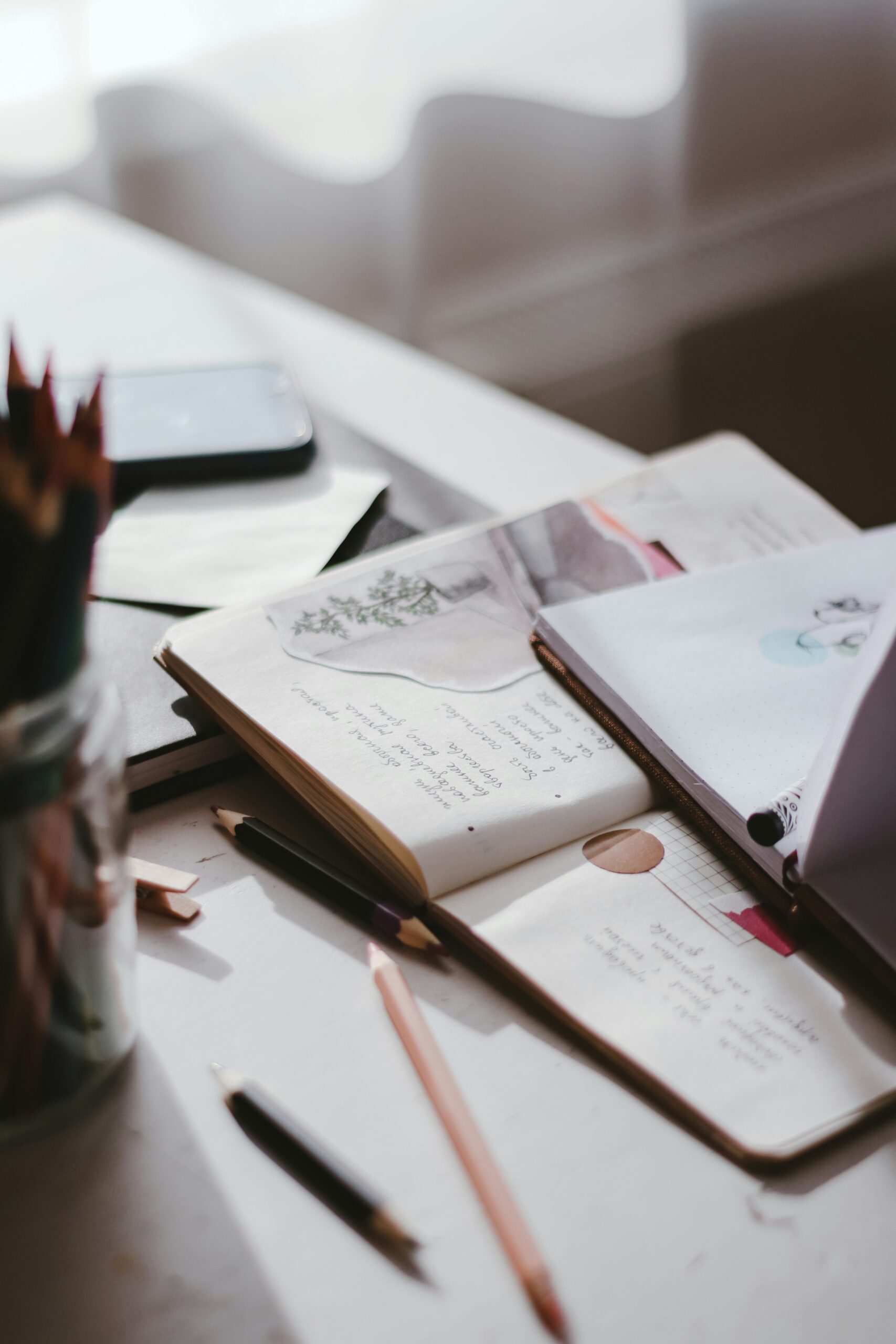 Notebooks lay on a table.