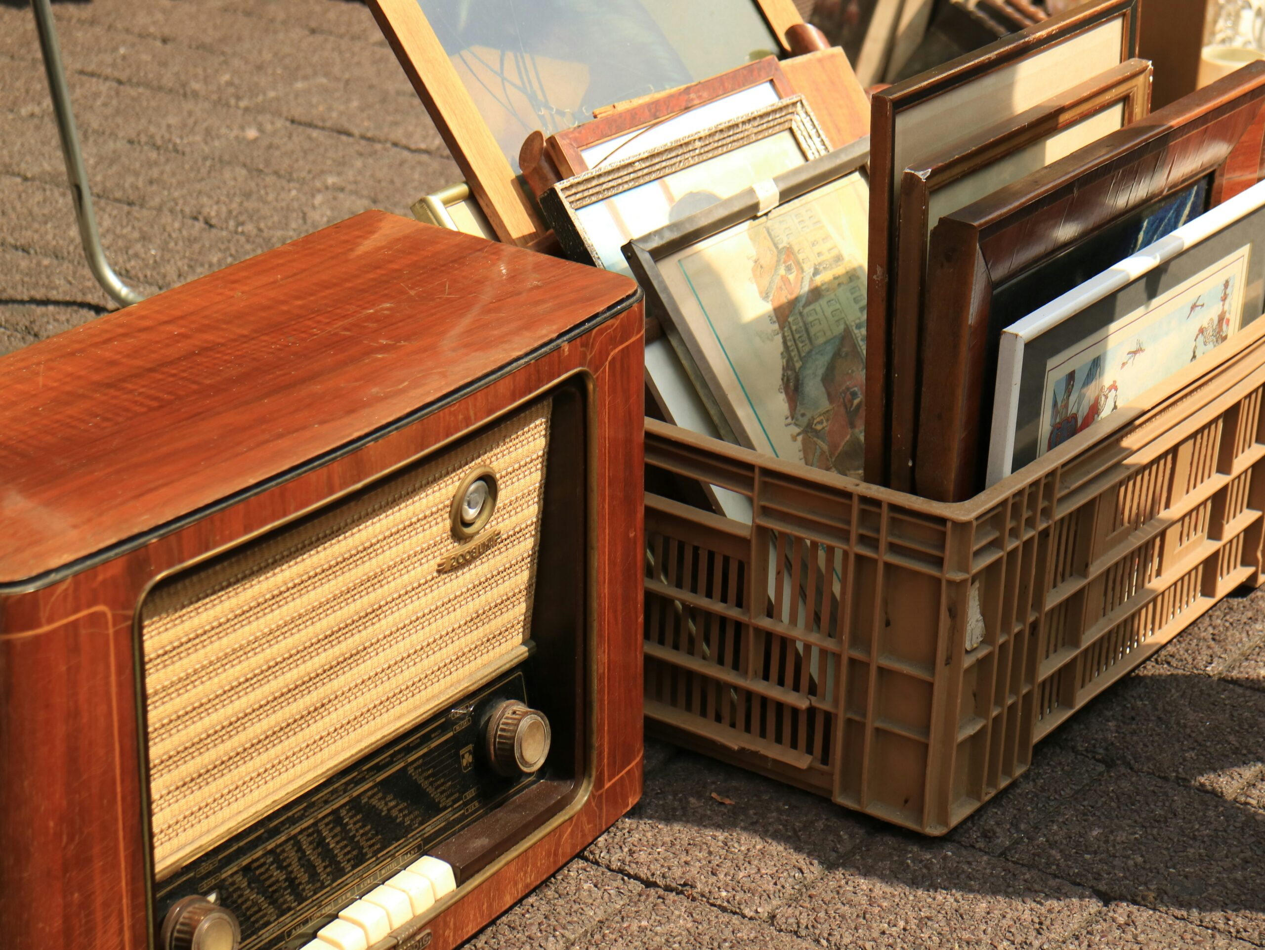 Heirlooms in a crate on the curb.