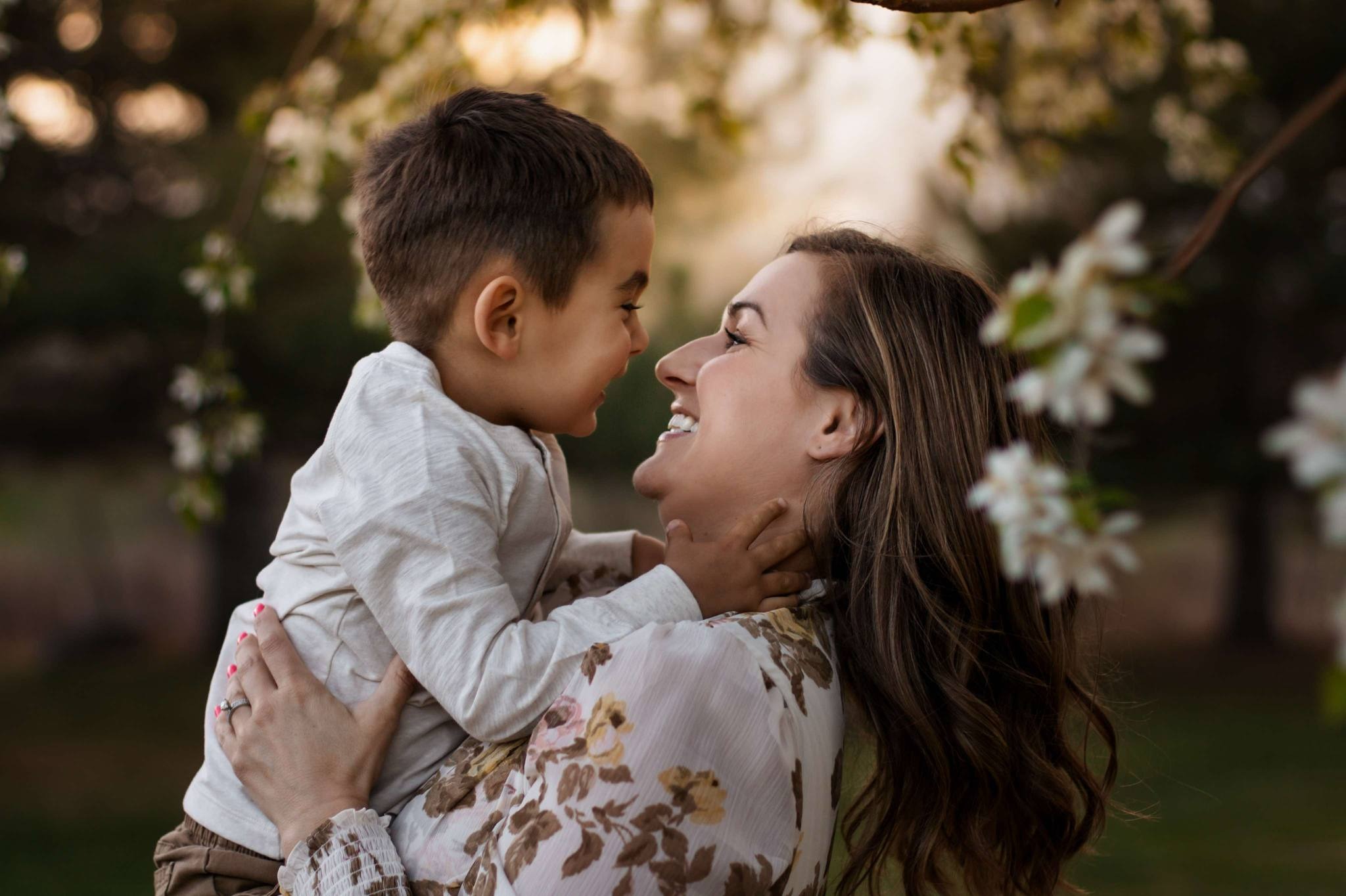 Kendra holding her son.