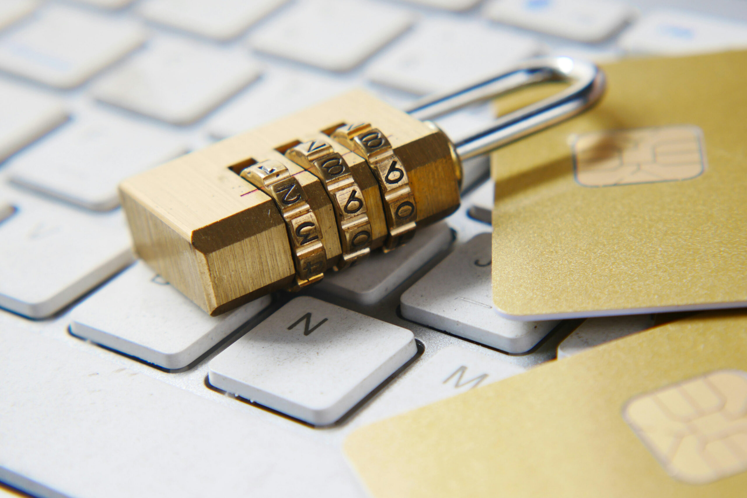 A lock sitting on a keyboard.
